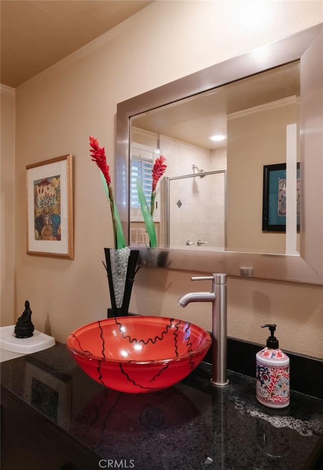 dining room with crown molding and sink