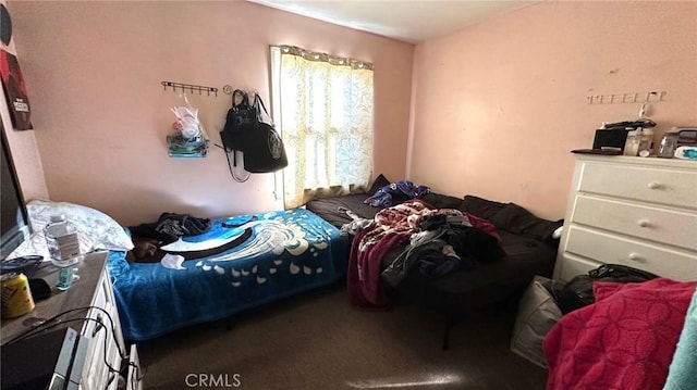 bedroom featuring carpet flooring