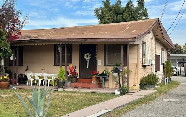 bungalow-style house with a front yard