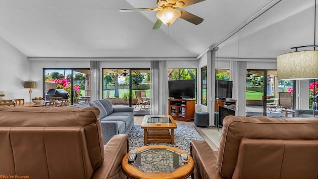 interior space with ceiling fan and vaulted ceiling