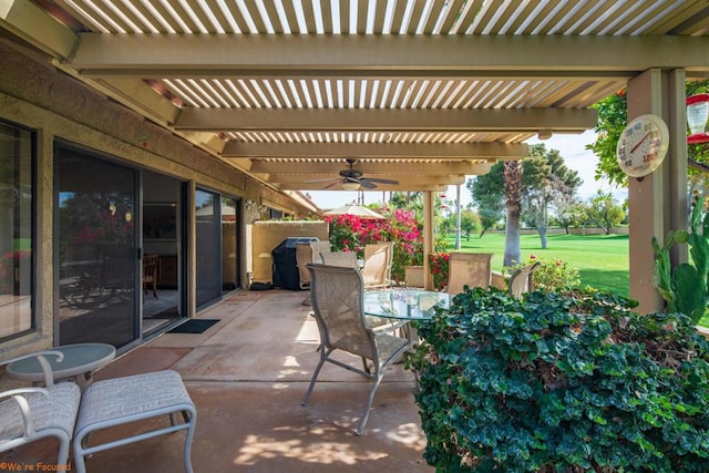 view of patio / terrace featuring ceiling fan and a pergola