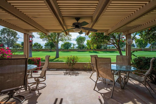 view of patio / terrace featuring ceiling fan and a pergola