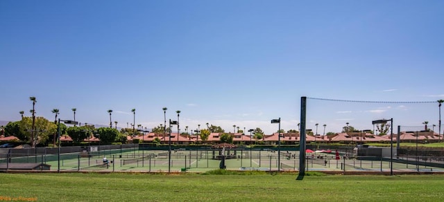 view of property's community with a yard