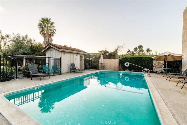 23821 Hillhurst Dr W Unit 44, Laguna Niguel, CA 92677 - community pool featuring an outdoor structure and a patio area