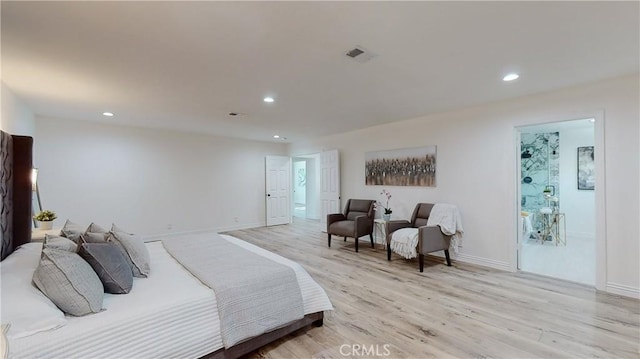 bedroom with light wood-type flooring