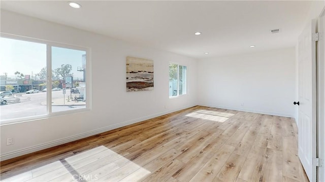 empty room featuring light hardwood / wood-style floors