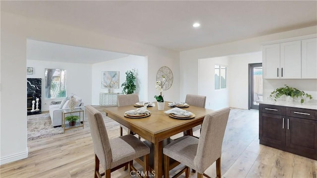 dining space featuring light hardwood / wood-style floors