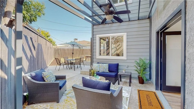 view of patio featuring outdoor lounge area and ceiling fan