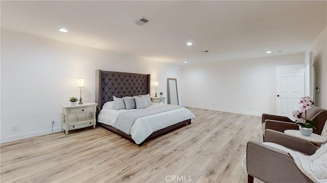 bedroom with light wood-type flooring