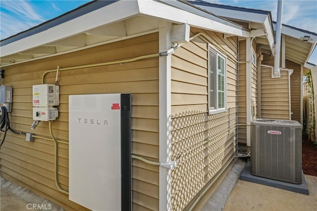 view of side of property featuring cooling unit