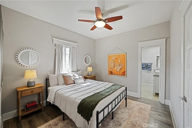 bedroom with hardwood / wood-style flooring and ceiling fan