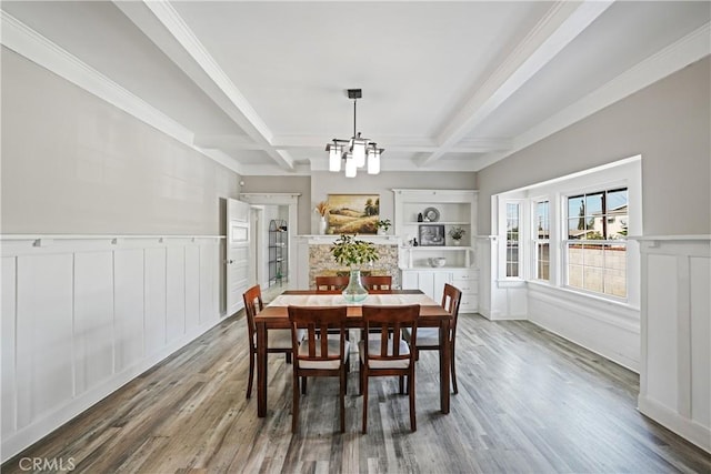 dining area with beamed ceiling, wood-type flooring, and coffered ceiling