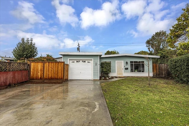 ranch-style house with a garage and a front yard