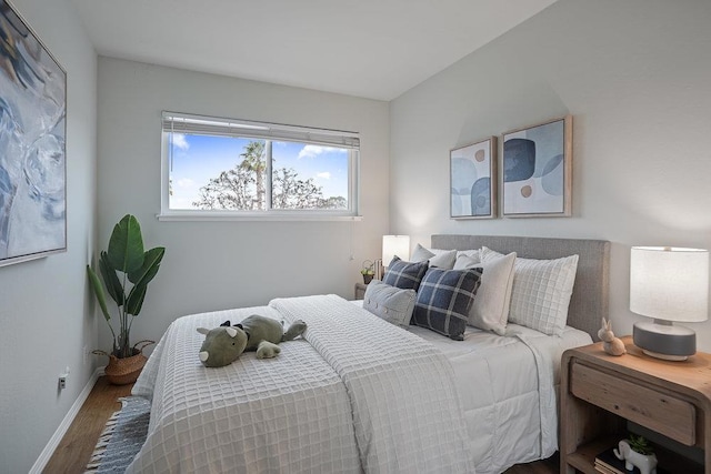 bedroom featuring wood-type flooring