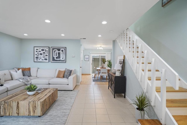 living room with light tile patterned flooring