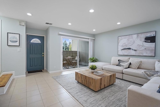 living room featuring light tile patterned flooring