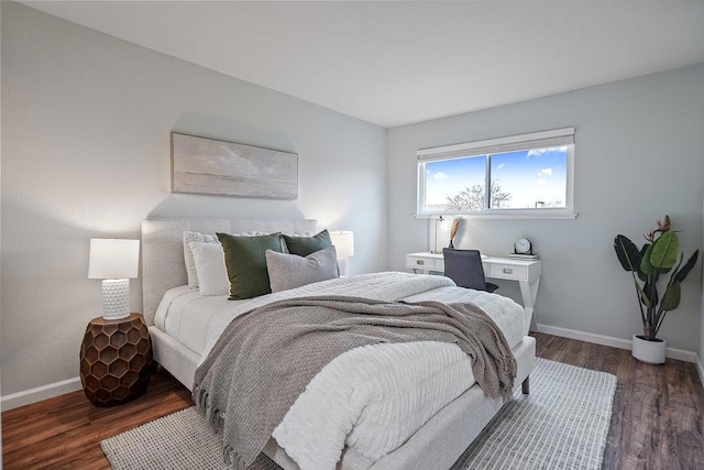 bedroom featuring dark wood-type flooring