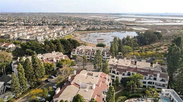 drone / aerial view with a water view