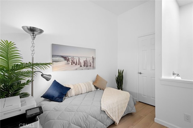 bedroom with light hardwood / wood-style flooring