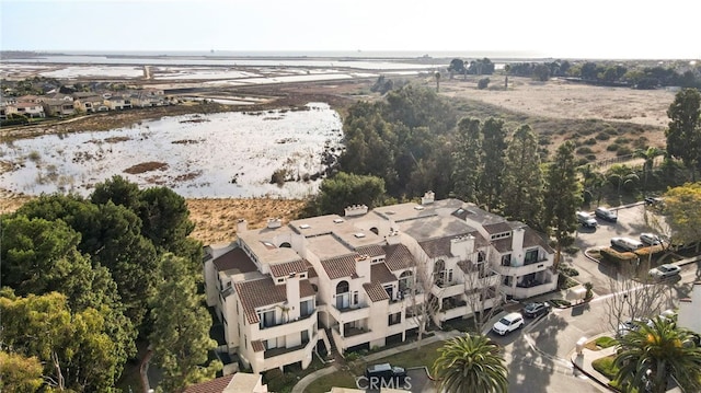 drone / aerial view with a water view