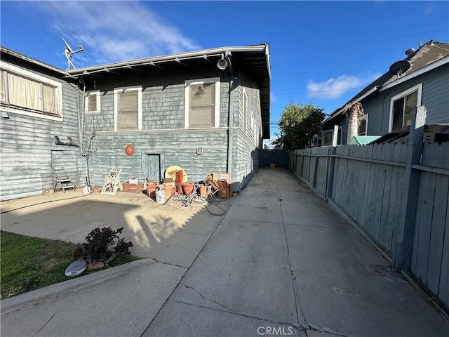521 S Chicago St, Los Angeles, CA 90033 - view of home's exterior featuring fence and a patio