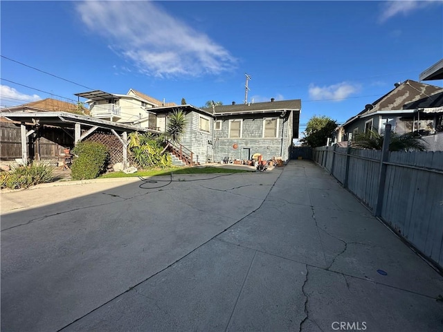 521 S Chicago St, Los Angeles, CA 90033 - exterior space with stone siding and fence