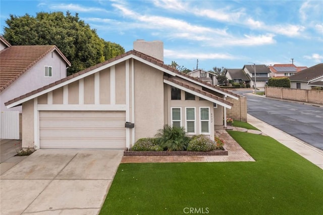 view of property exterior featuring a garage and a lawn