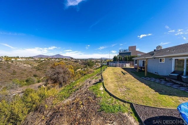 view of yard with a mountain view