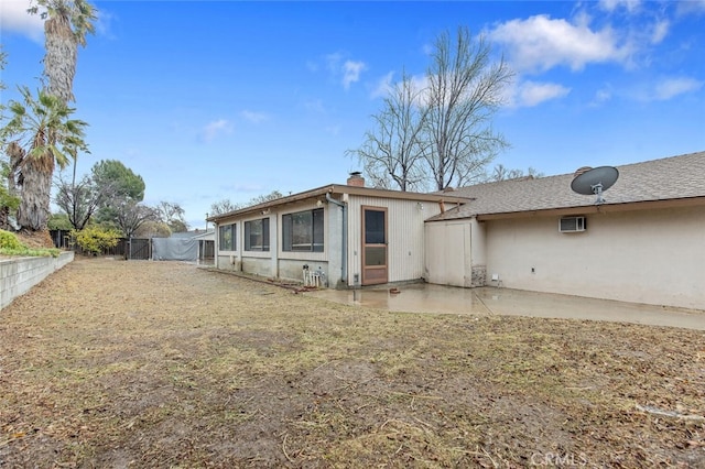 rear view of house featuring a patio area