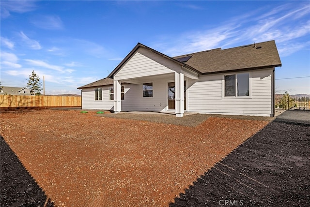 rear view of property with a patio