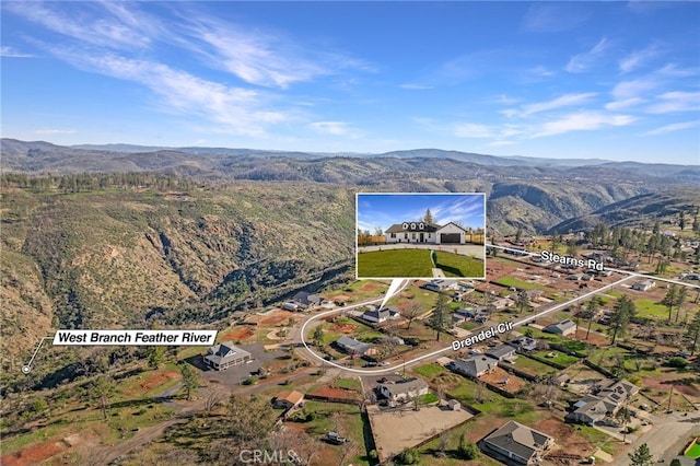 bird's eye view with a mountain view