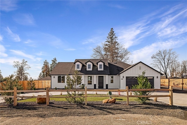 modern farmhouse featuring a garage