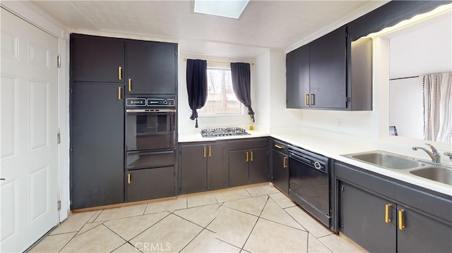 kitchen with light tile patterned flooring, sink, and black appliances