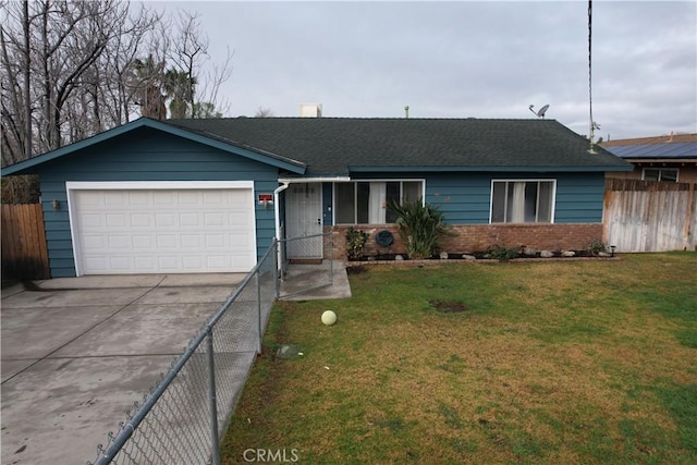 single story home with a garage and a front lawn