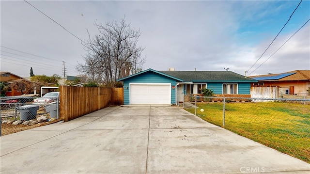 ranch-style home with a garage and a front yard