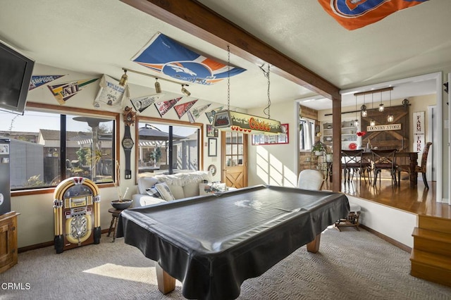 recreation room with a healthy amount of sunlight, billiards, beamed ceiling, and carpet