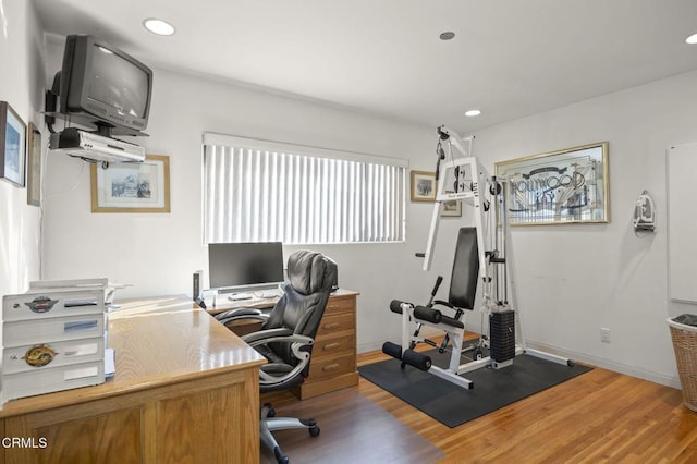 office with hardwood / wood-style floors