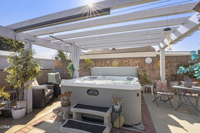 view of patio with a pergola and a hot tub