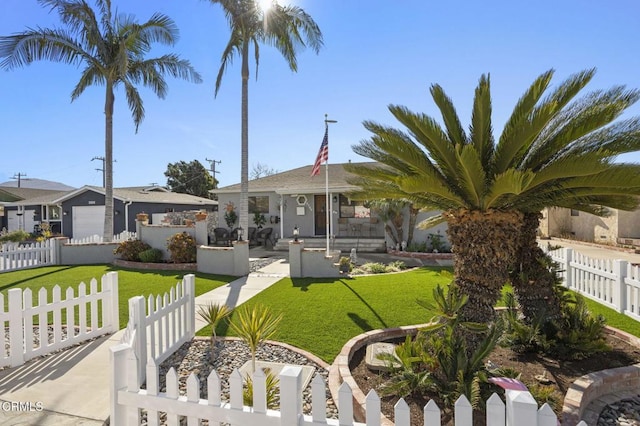 view of front of property with a front yard and a patio