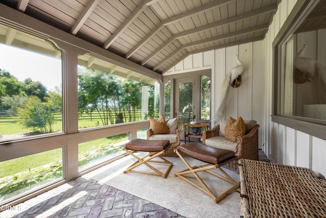 sunroom / solarium featuring vaulted ceiling with beams and wood ceiling