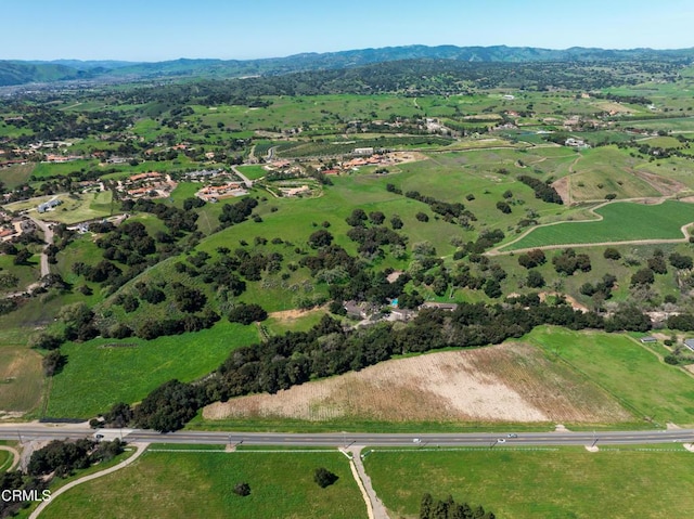 drone / aerial view with a rural view and a mountain view