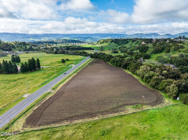 drone / aerial view with a rural view and a mountain view