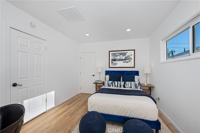 bedroom featuring hardwood / wood-style floors