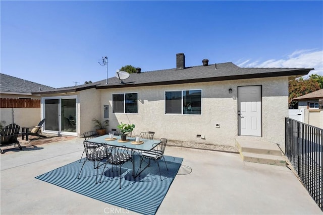 rear view of house with a patio area