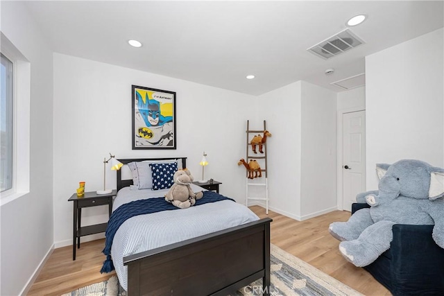 bedroom featuring light hardwood / wood-style flooring