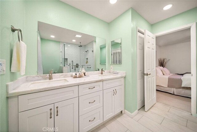 bathroom with vanity and walk in shower