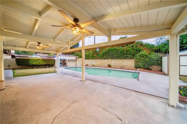 view of pool with a patio area and ceiling fan