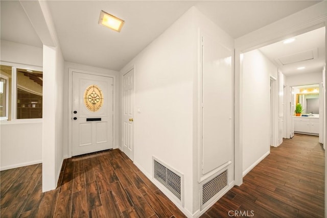 foyer entrance with dark hardwood / wood-style flooring