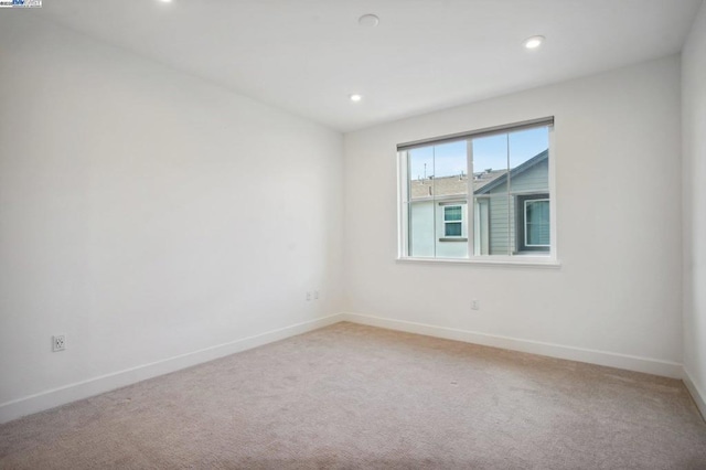 spare room with carpet flooring