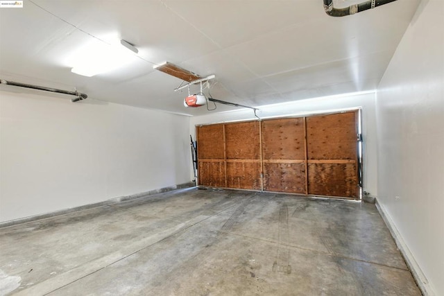 garage featuring a garage door opener